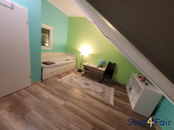 bedroom with two beds in house near Messe West Hannover