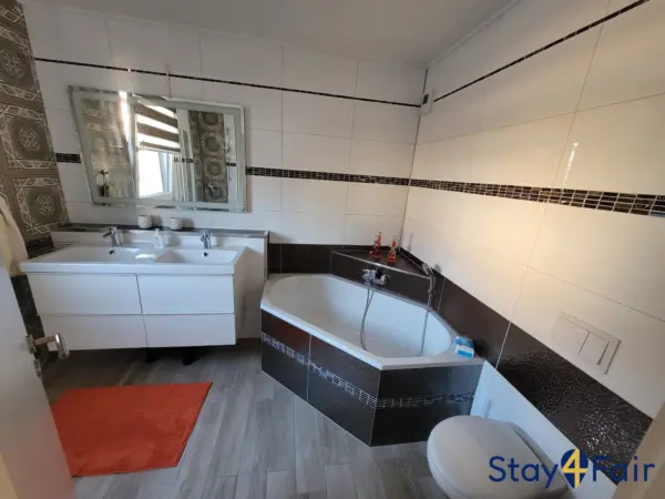 bathroom with bathtub and shower in private house Hannover