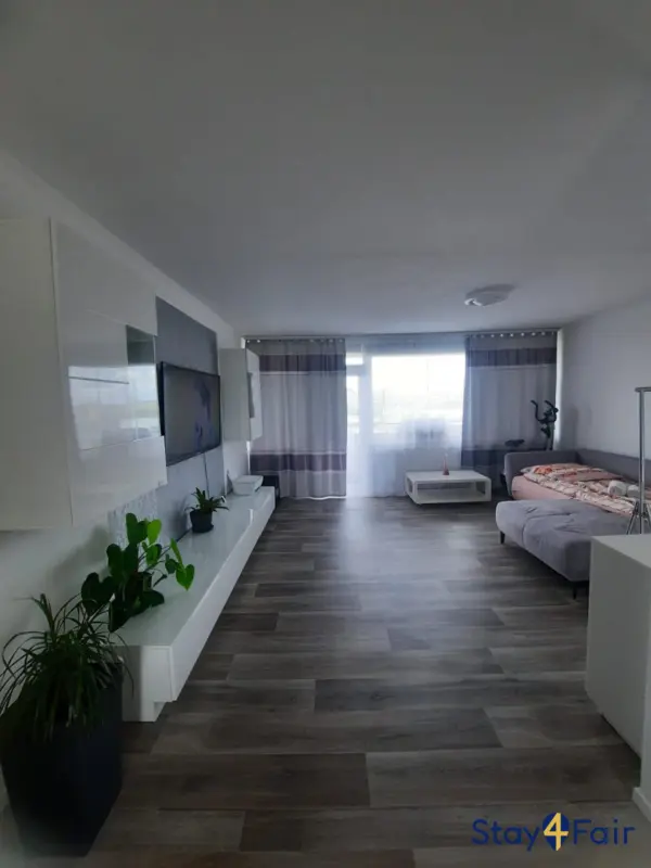 bright living room in 3 room apartment near Hannover exhibition center