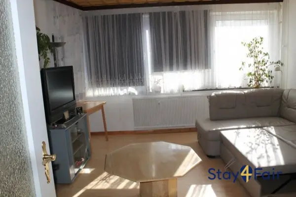 clean living room in simple 2 room apartment near Hannover Messe West