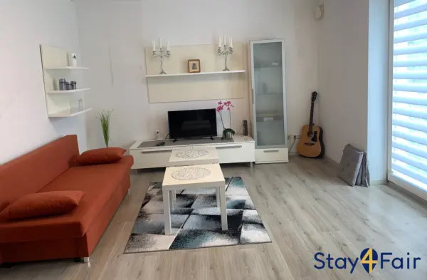 living room with sofa bed in apartment near Hannover Messe Ost