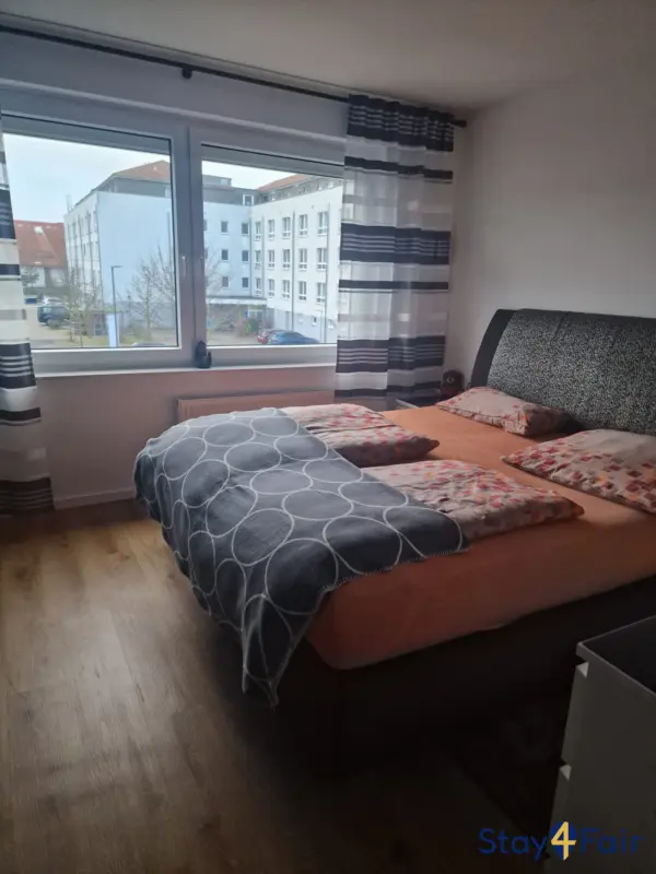 bedroom in apartment near Hannover exhibition center