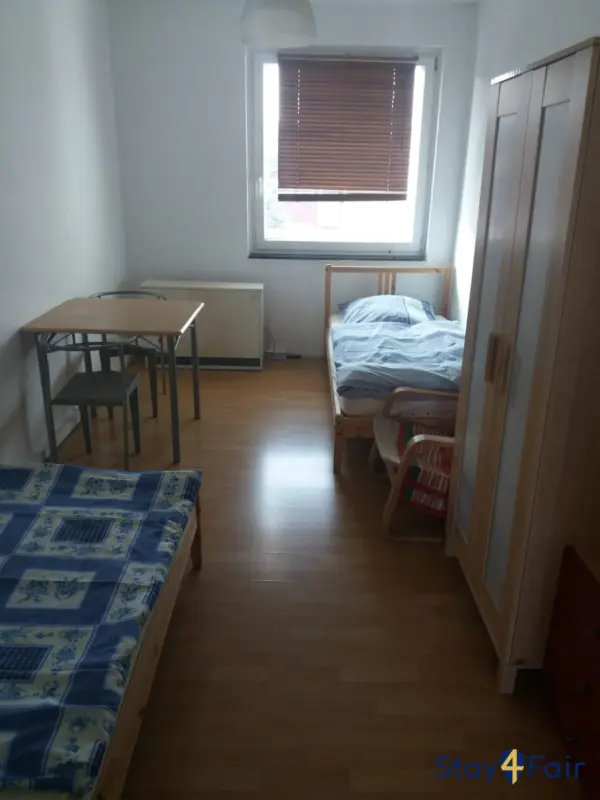 simple living room in 2 room apartment near Hannover exhibition center