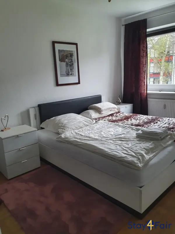 bedroom with double bed in clean apartment Hannover