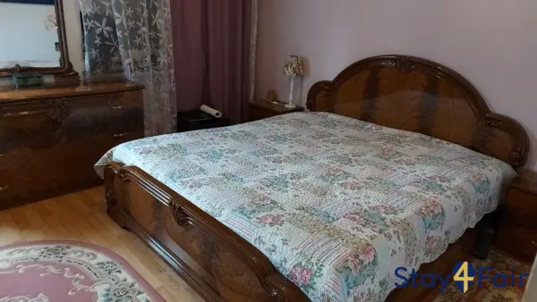 bedroom with double bed in 2 room apartment Hannover
