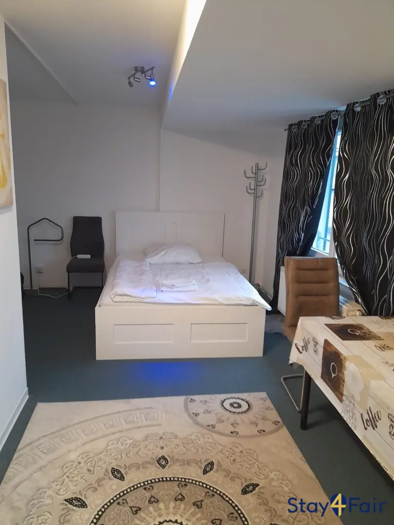 semi double bed in studio apartment near Hannover exhibition center