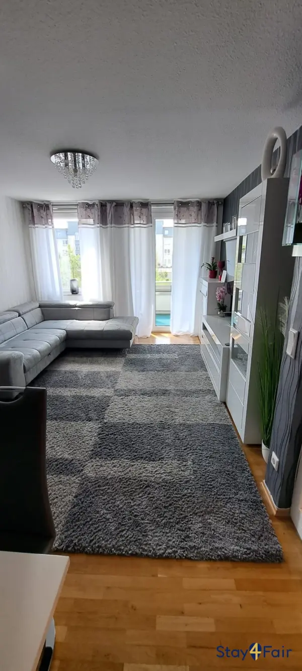 living room with two sofa beds in 3 room apartment Hannover