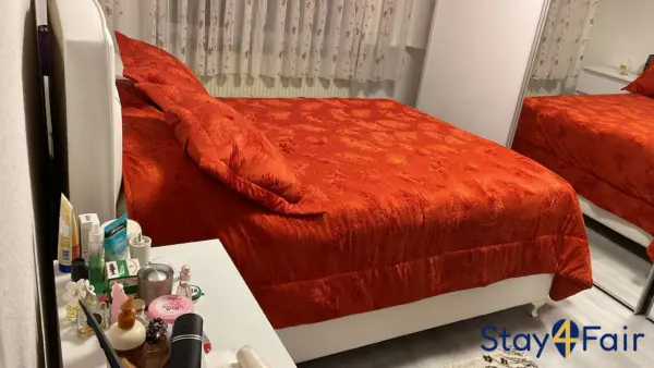 bedroom with double bed in apartment in Hannover city center area